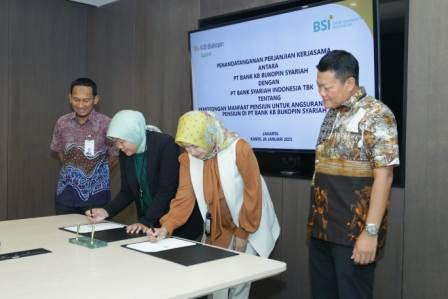 FOTO: Prosesi penandatangan BSI dan Bank KB Bukopin Syariah di kantor pusat BSI, The Tower, Jakarta, Jumat (27/1/2023). FOTO: DOK. BSI